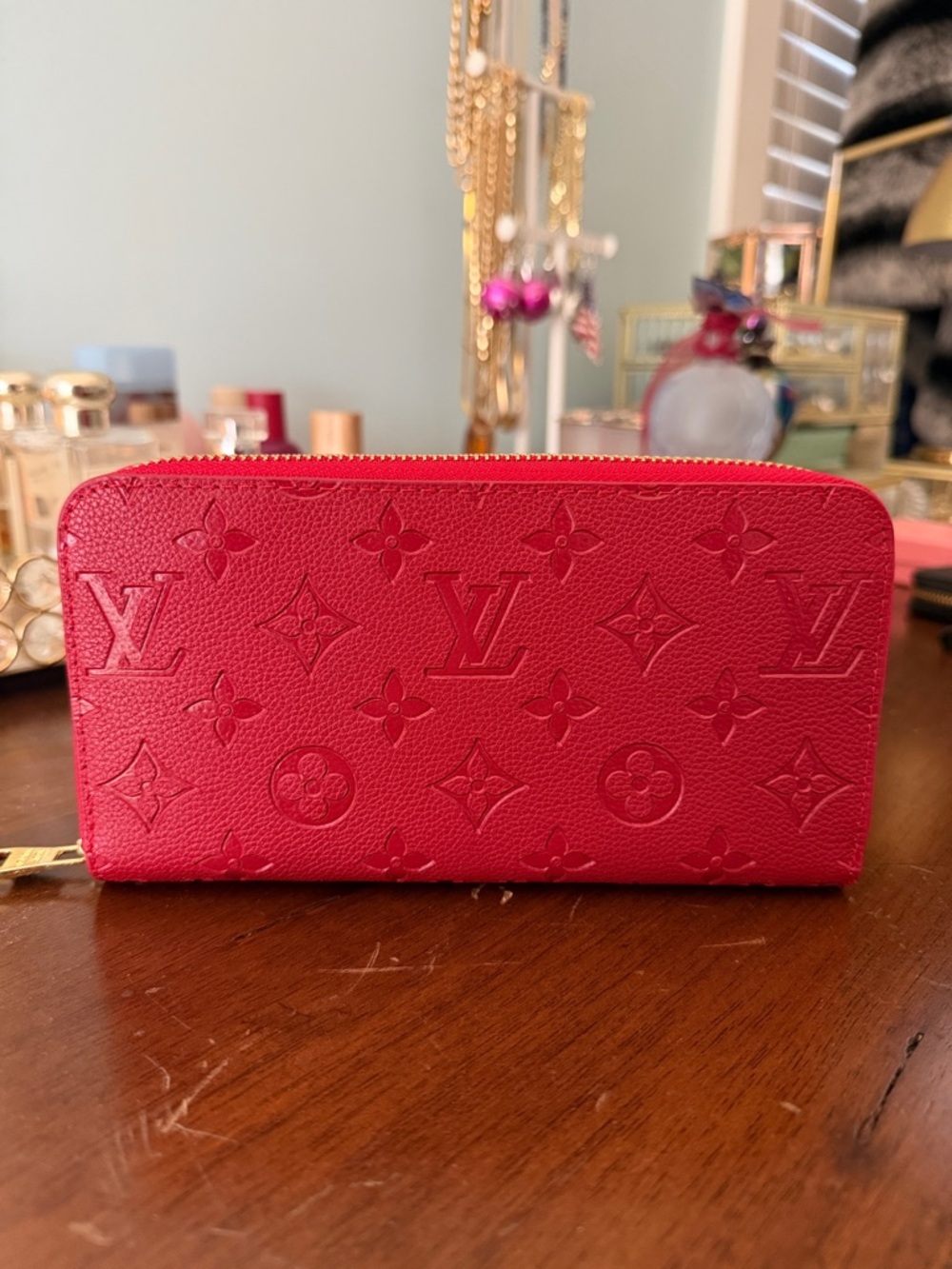 Louis Vuitton Red Monogram Embossed Zip Wallet